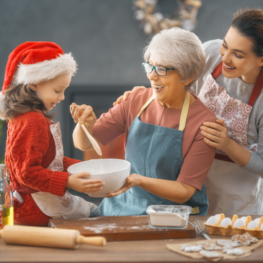 
A mother cooking in the kitchen with her daughter, sharing moments and creating delicious treats, inspired by fun Christmas ideas.